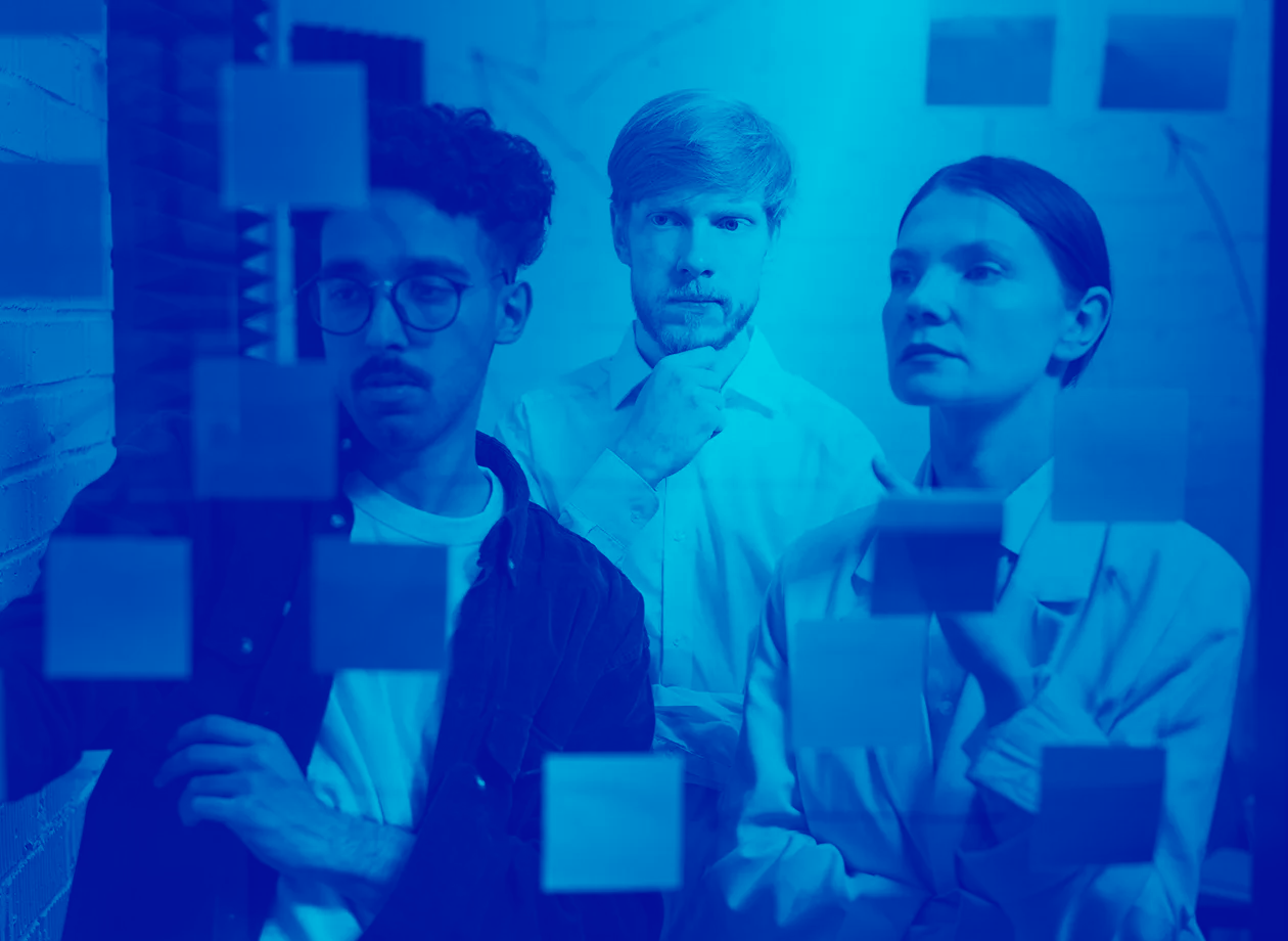 Team discussing reference process